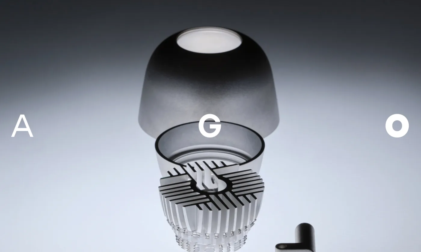 Close-up of a contemporary AGO Lighting lamp with the letters A G O overlaid